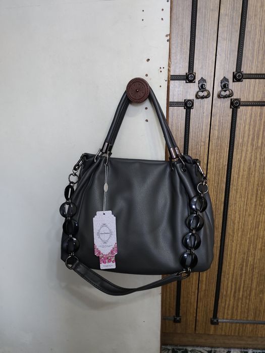 Продам новую кожаную сумку