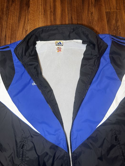 ADIDAS 90s retro windbreaker for men in blue and black colour.