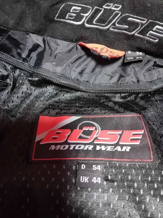 Част от  моториски  костюм-яке