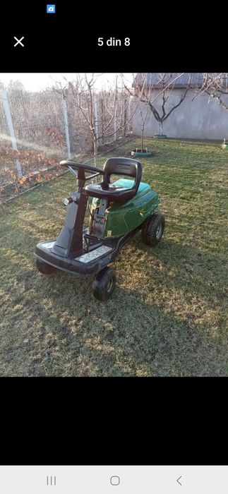 Tractoras de tuns gazonul si de carat