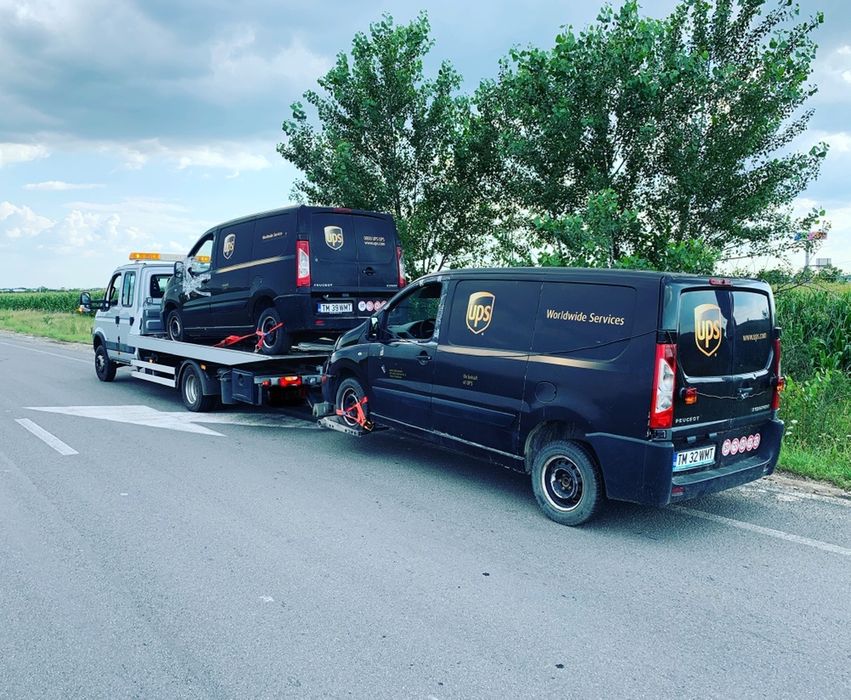 Tractari auto utilaje transport slep platforma auto blocat incuiat