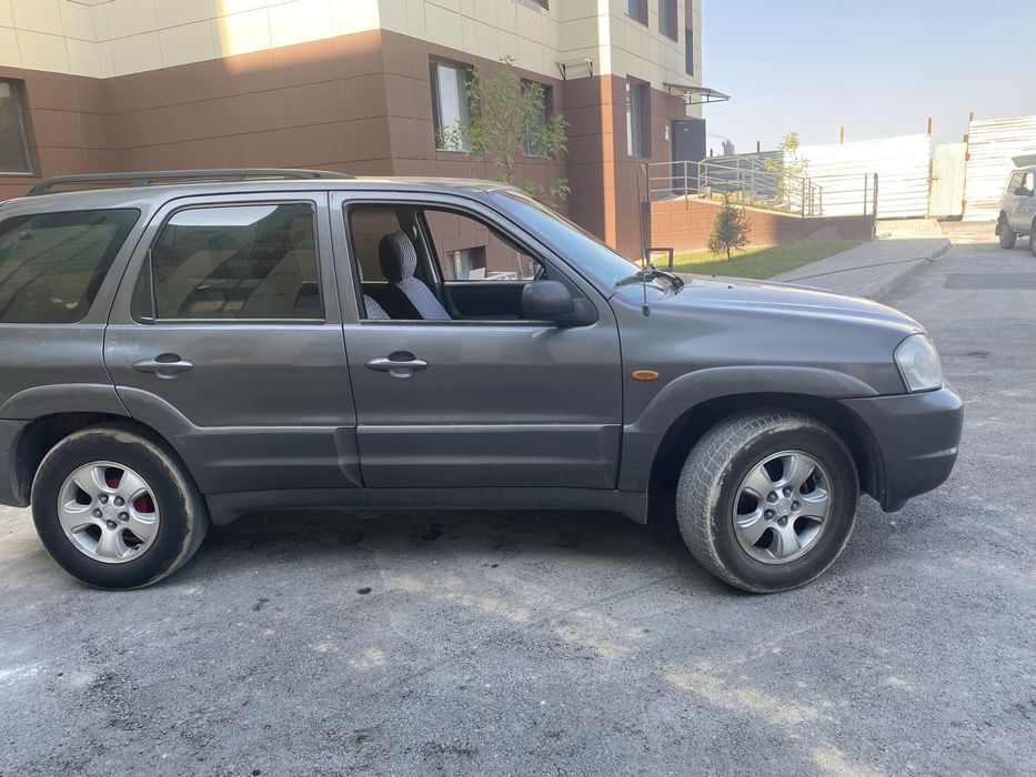 Мазда Трибют