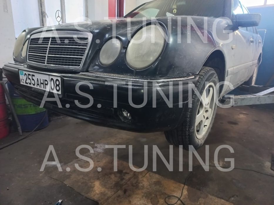 Бампер Мерседес 210 Е50 АМГ лупарь