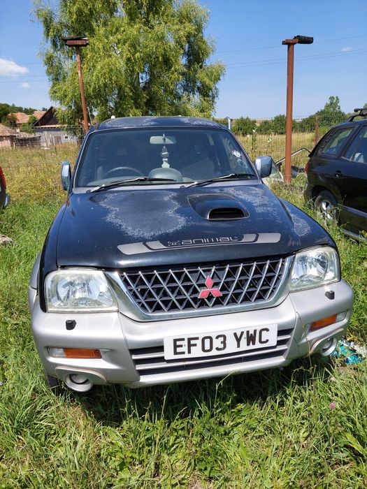 Dezmembrez Mitsubishi l200, motor 2.5 diesel, an 2003