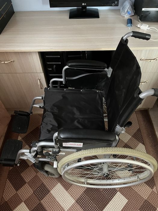 Инвалидное кресло