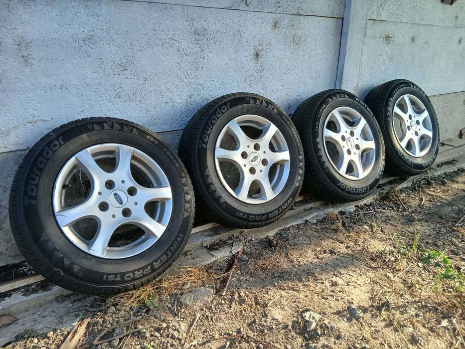 Употребявани всесезонни гуми R 14 с алуминиеви джанти