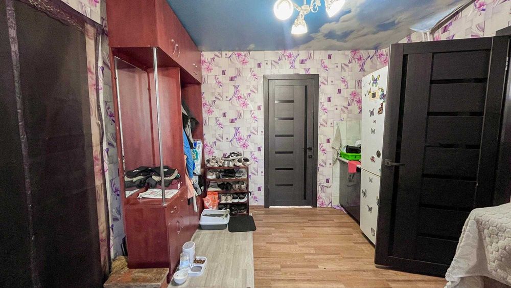 Дом в Отенай, Танат Империя