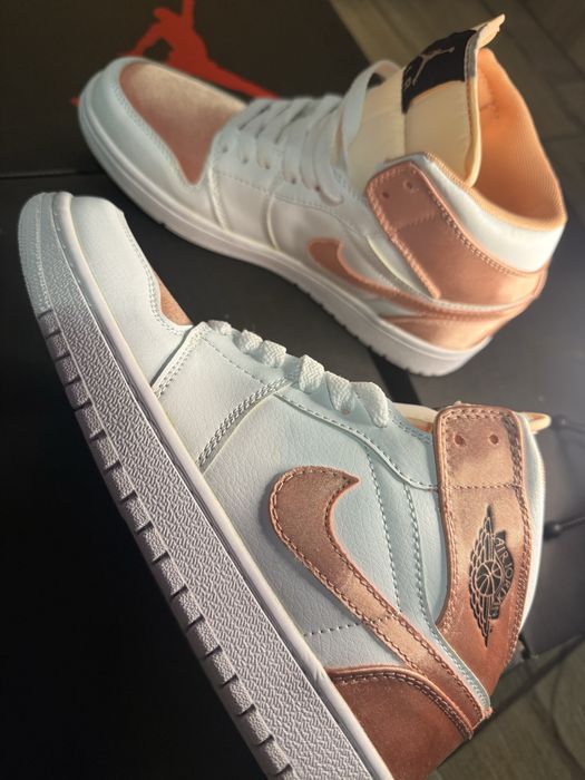Nike Air Jordan 1 Mid in the white and rose gold