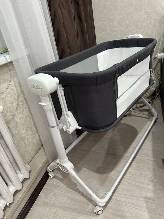 Детская кроватка с маятниковым приводом