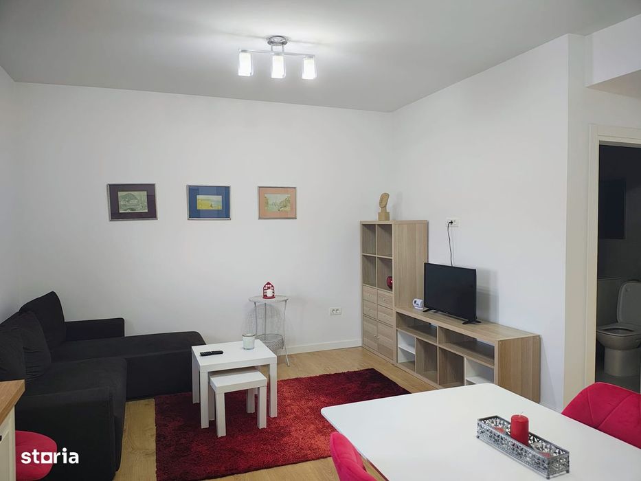 Apartament de închiriat cu grădină, parcare și facilități moderne