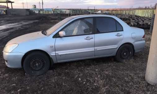 Автомобиль Mitsubishi Lanсer