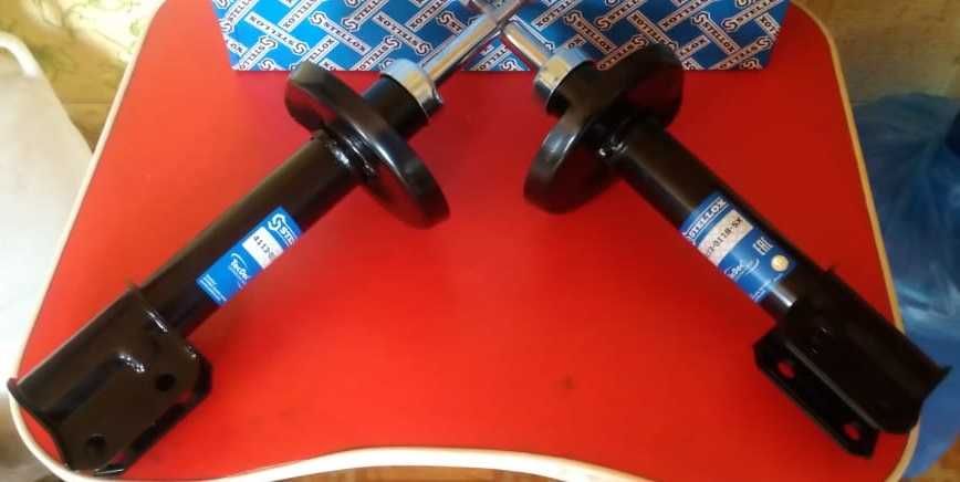 стойка амортизатора OPEL Corsa