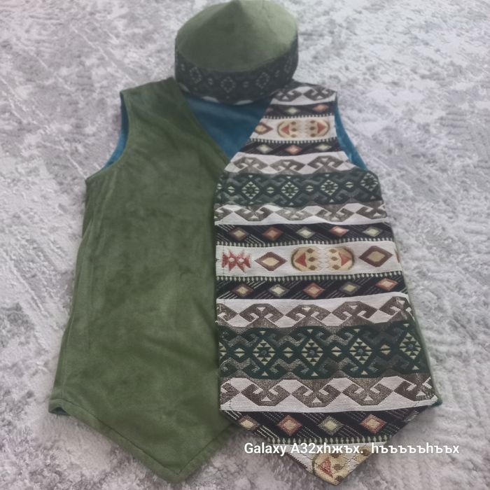 ұлттық жакеттер тақиясымен