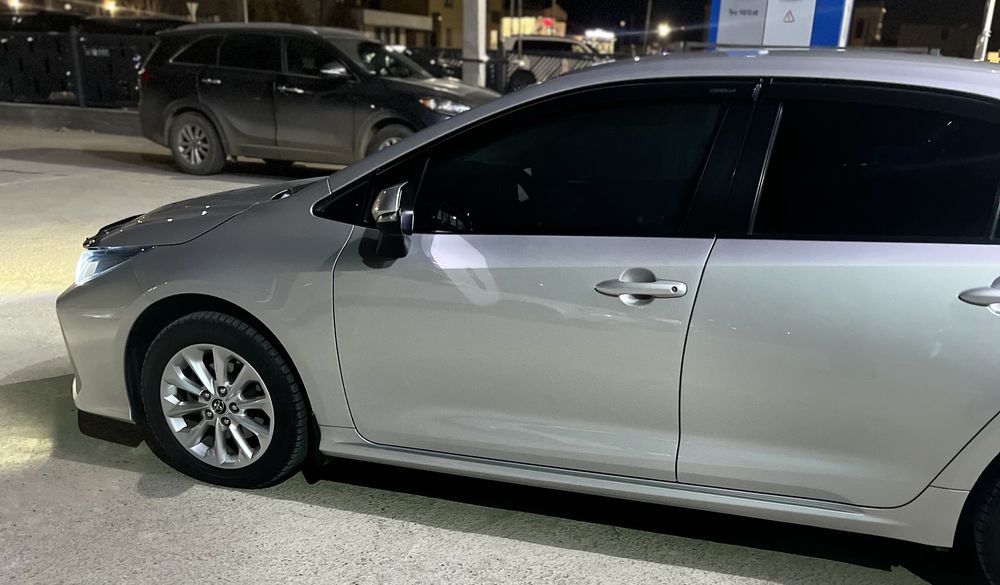 Tayota Corolla E210
