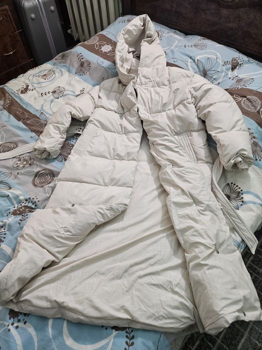 Продам пуховик новый