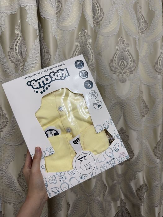 комплекты одежды для новорожденных