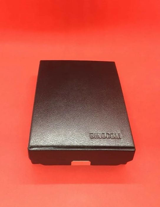 Compas atașabil pentru binoclu