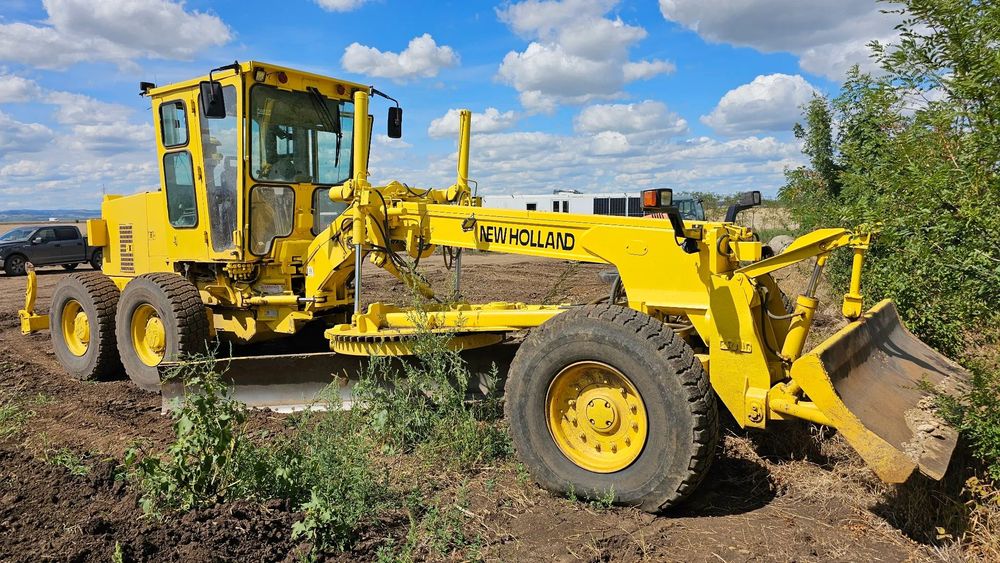 New Holland Greder F106.6 6x4 cu scarificator