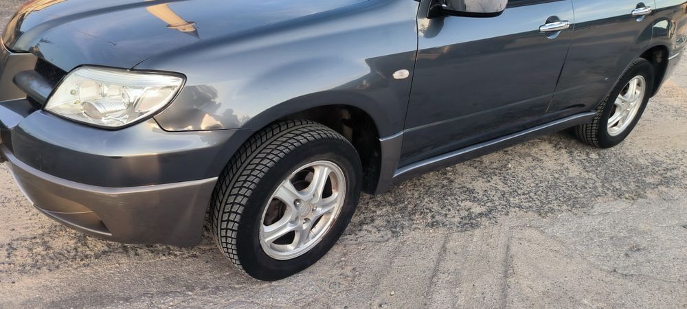 Mitsibihi outlander 2.0 136 к.с 4x4