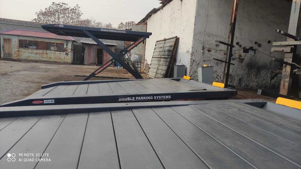 «Два авто на одном месте: Двухуровневая парковка от производителя»