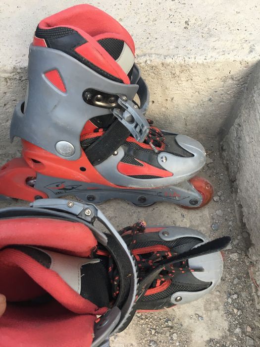 Роликовые коньки