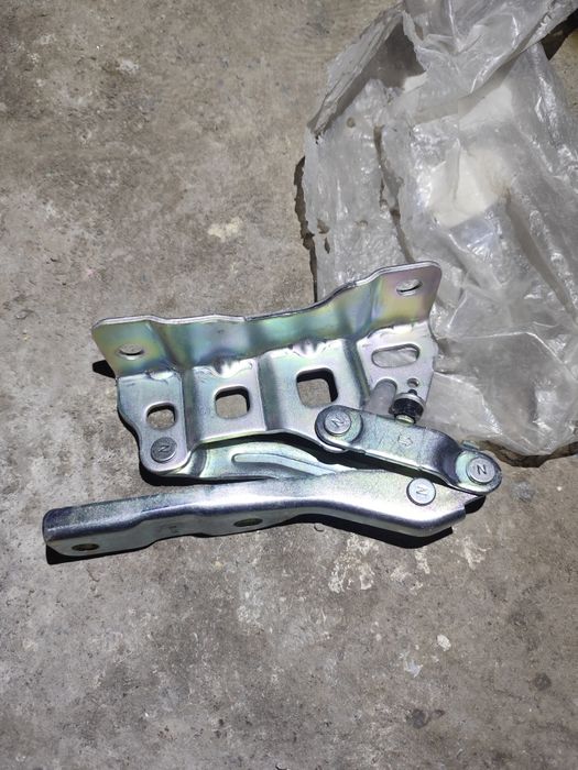 Петля капота Туксон