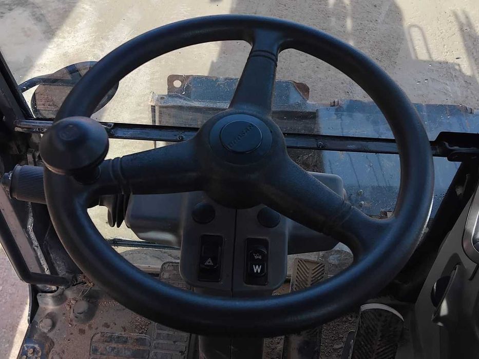 Колесный экскаватор Doosan DX190W-5