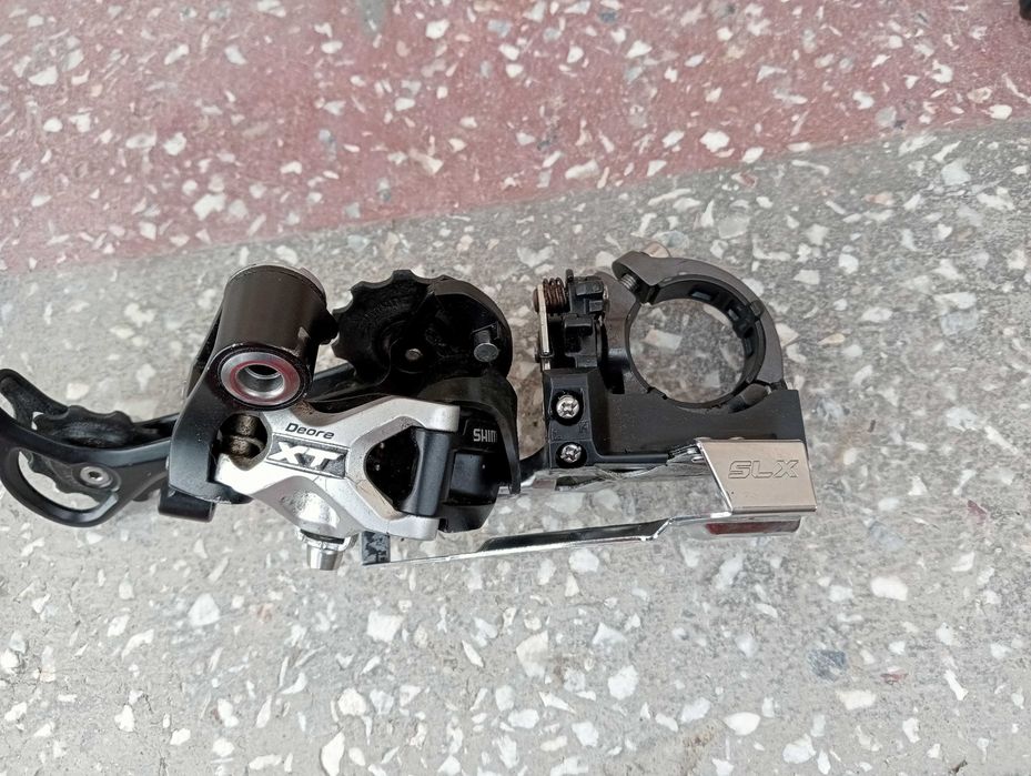 Angrenaj pedalier Deore manete  Shimano SLX schimbator spate Deore XT  Roata fata Mavic Campagnolo cursiera sea SQlab