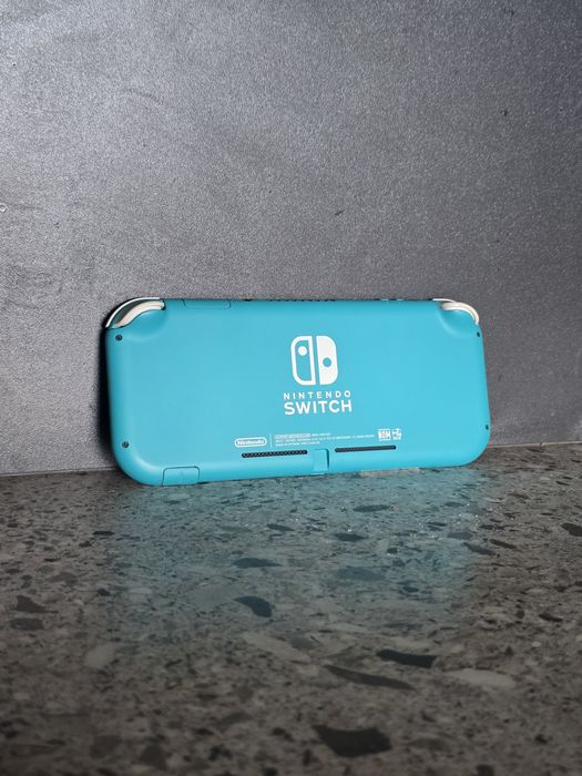 Конзола Nintendo Switch Lite + 9 игри и пълен комплекm akcecoapu