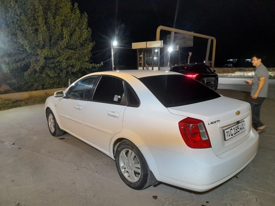 Ласетти 2011.  2 позится