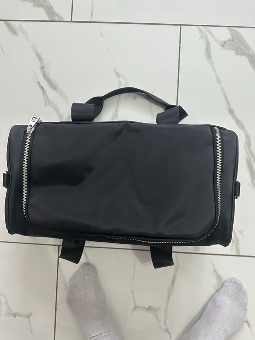 Geamantan versace de mana