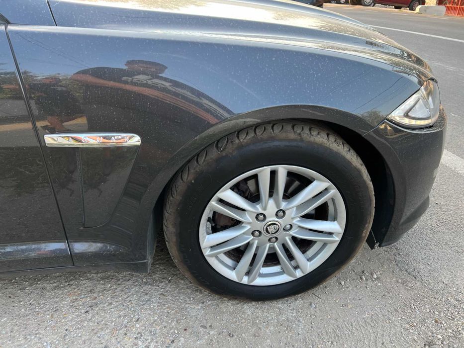 Aripa dreapta fata Jaguar XF facelift 2011 2016 neagra faruri bi-xenon