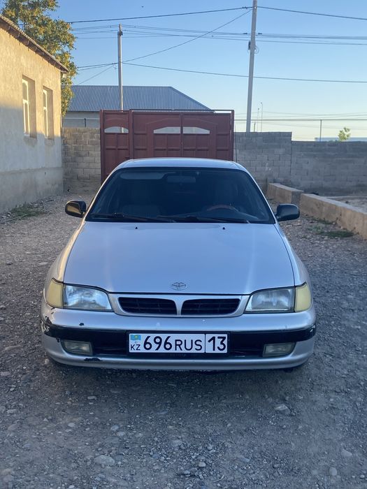 Tayota Carina E  Газ бензин