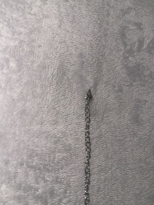 Шекелік сырғасымен бірге