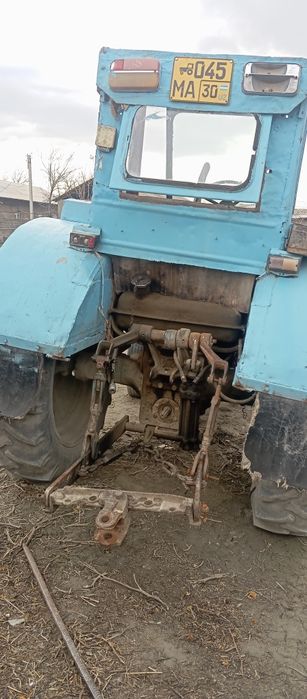 Traktor bilan dukisi birga