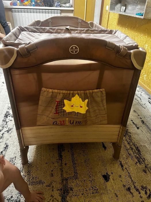 Детская кроватка - манеж