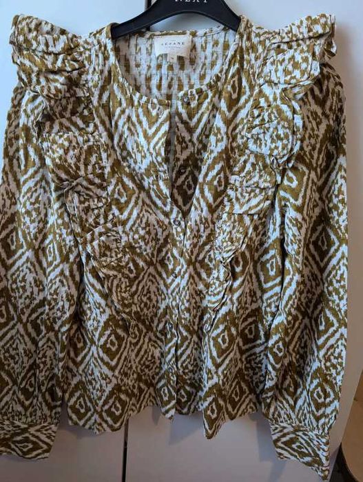 Риза Sezane , като нова