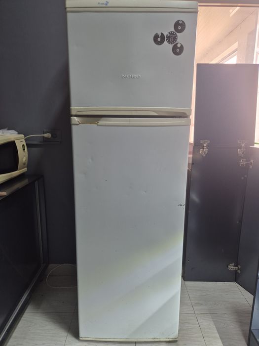 chotki ishlab turgan holodilnik buyi 175 smlik