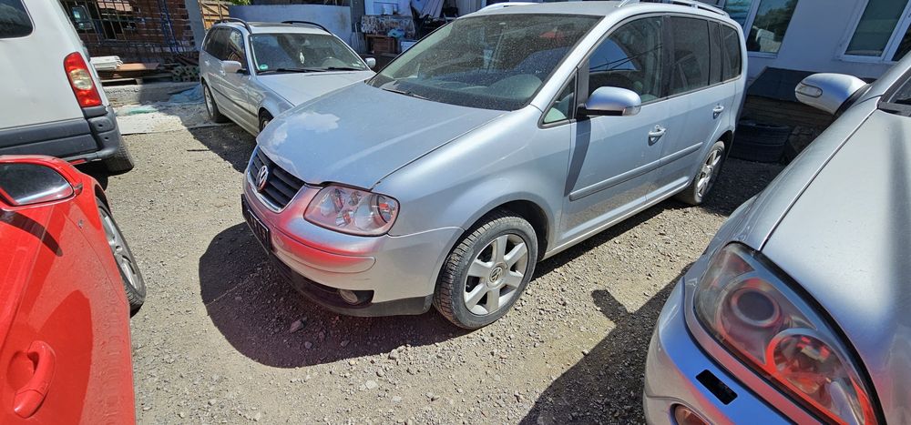 На части VW Touran 2.0