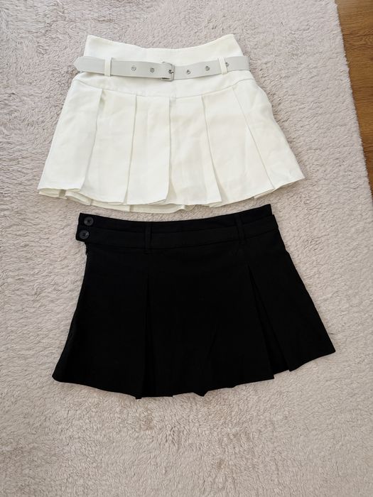 Пола панталони в черен и бял цвят