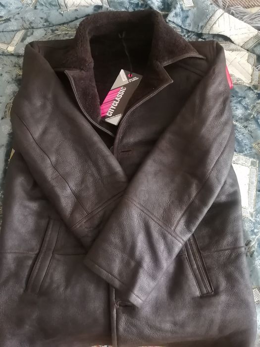 Продам  натуральный дублёнку новая