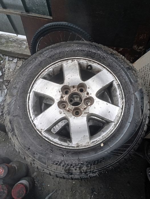 Титановый диск от тайоты с резиной