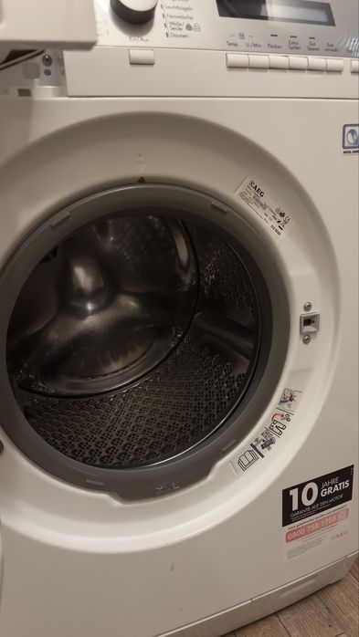 Пералня AEG 9 kg с пара + Сушилня Siemens 8 kg