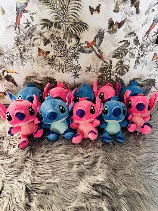 Ursulet plus stitch canta melodia desenului disney