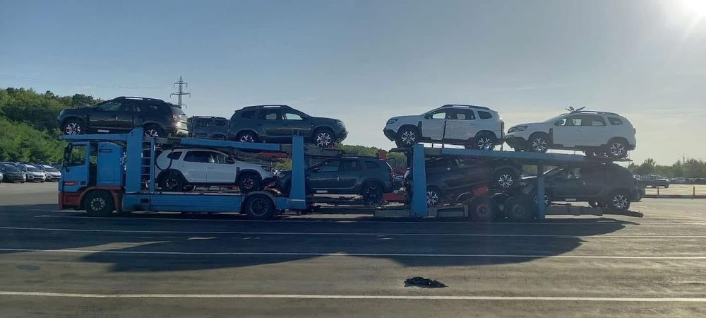 Transport autoturisme microbuze dube utilaje Italia  Romania