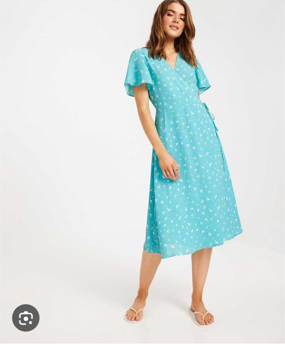 Рокля с прехлупване