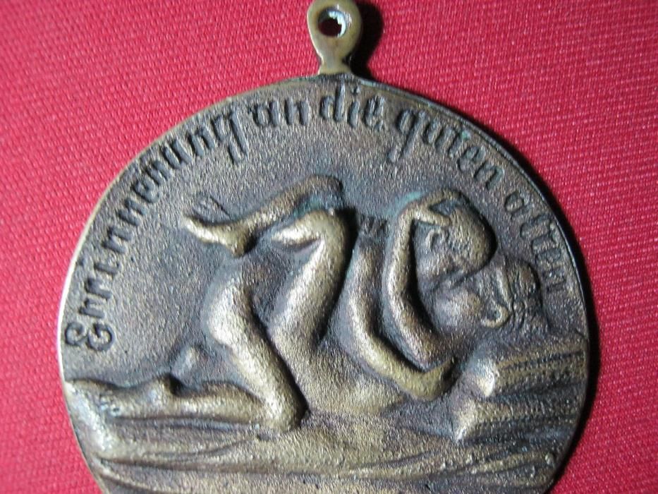Medalie,medalion,sexualitate explicita,Germania.