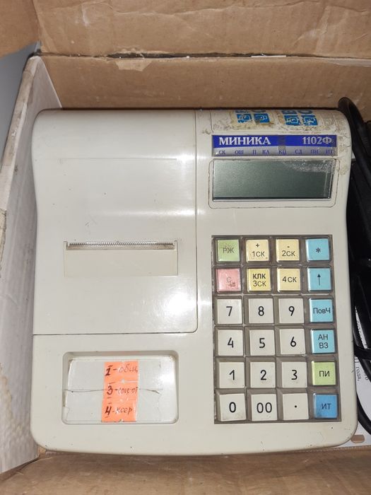 Продам кассовый аппарат Миника,
