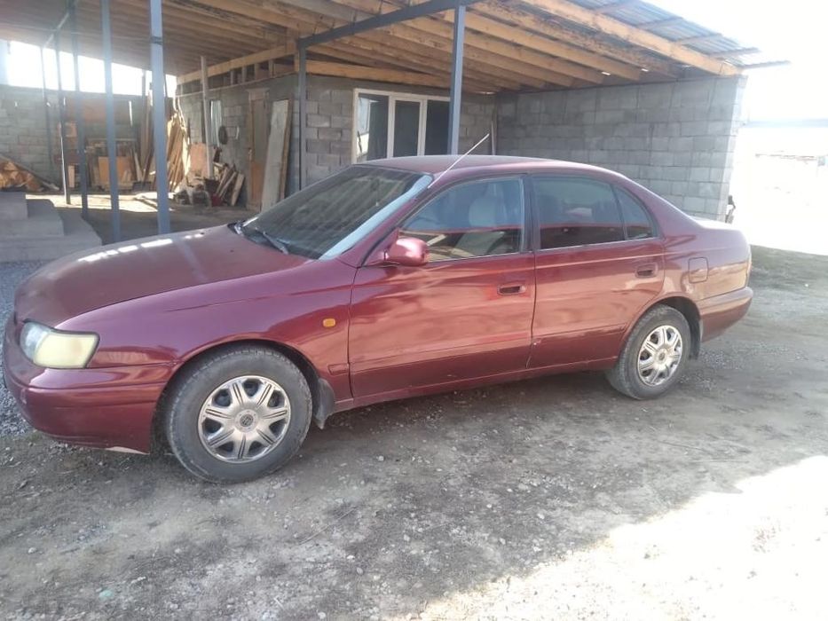 Тойота Карина Е-