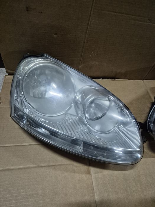 Set Faruri Originale VW Golf5/Jetta. Volan stinga.